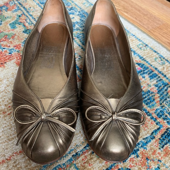Salvatore Ferragamo bronze ballet shoes.